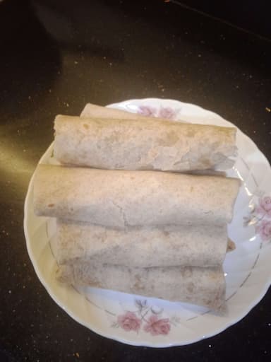 Tasty Chicken Burritos cooked by COOX chefs cooks during occasions parties events at home