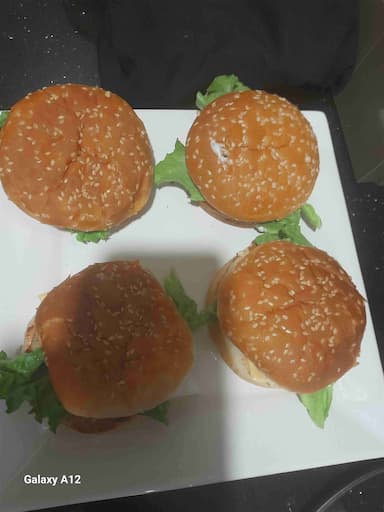 Tasty Chicken Tikka Burgers cooked by COOX chefs cooks during occasions parties events at home