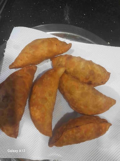 Tasty Veg Empanada cooked by COOX chefs cooks during occasions parties events at home