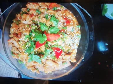 Tasty Chicken Schezwan Noodles cooked by COOX chefs cooks during occasions parties events at home