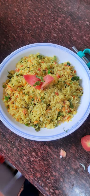 Tasty Poha cooked by COOX chefs cooks during occasions parties events at home