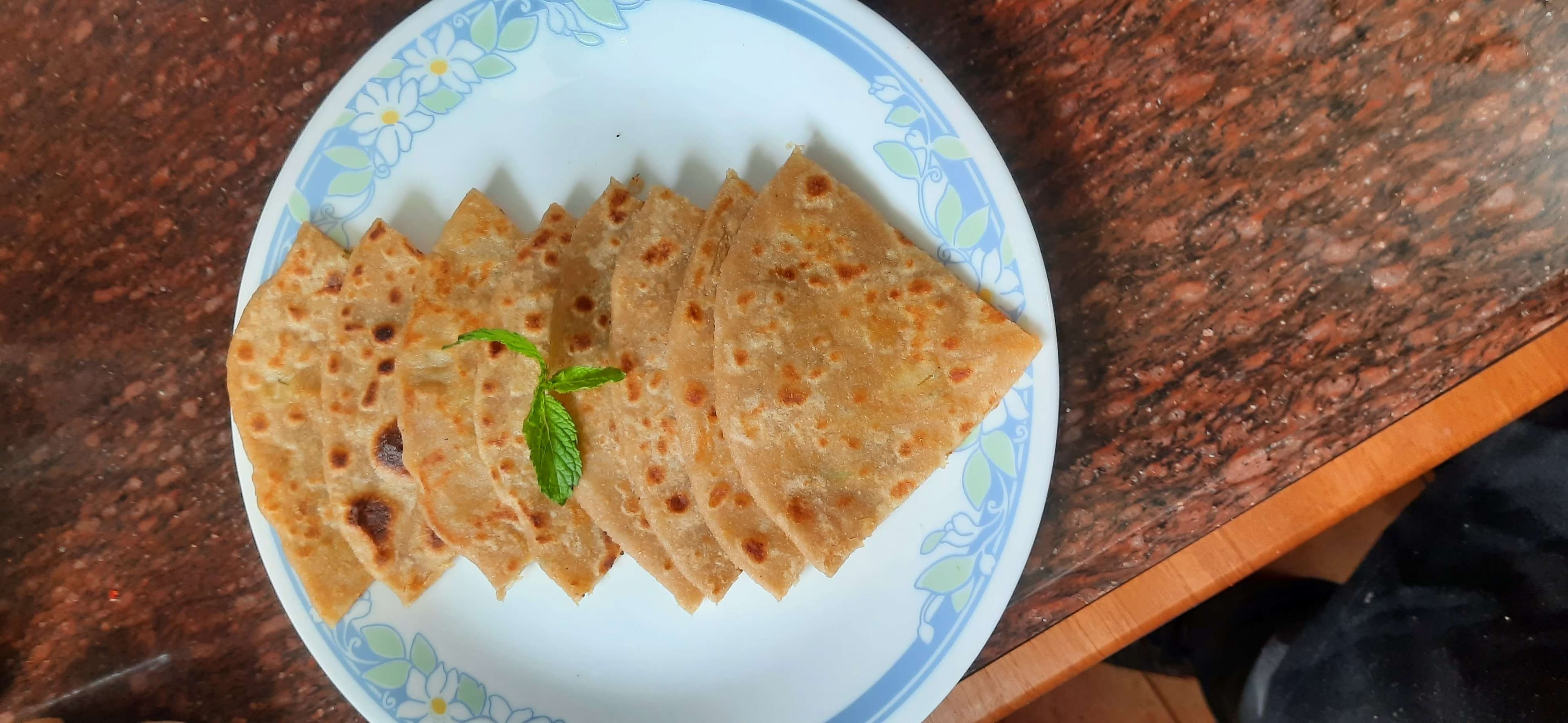 Delicious Stuffed Paranthas prepared by COOX