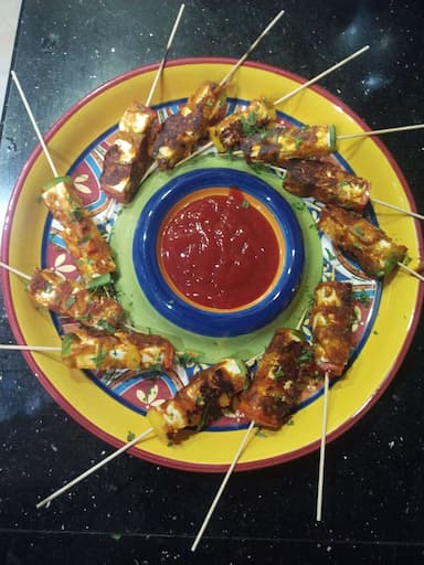 Tasty Thai Paneer Satay cooked by COOX chefs cooks during occasions parties events at home