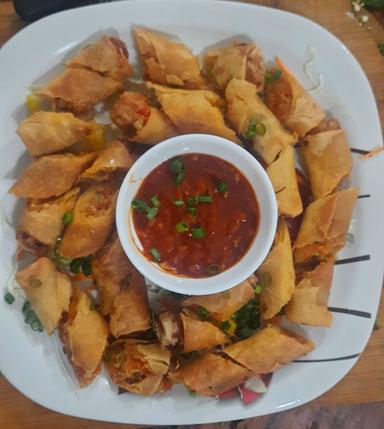 Delicious Veg Spring Rolls prepared by COOX