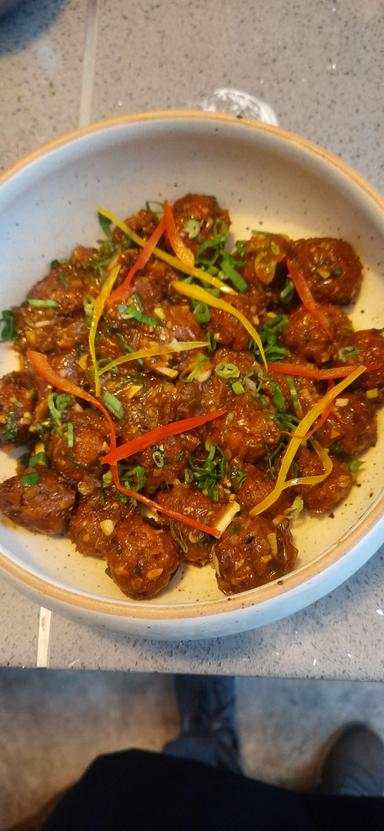 Delicious Veg Manchurian (Dry) prepared by COOX