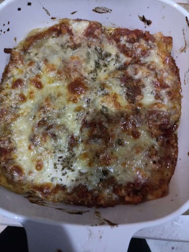Tasty Chicken Lasagna cooked by COOX chefs cooks during occasions parties events at home