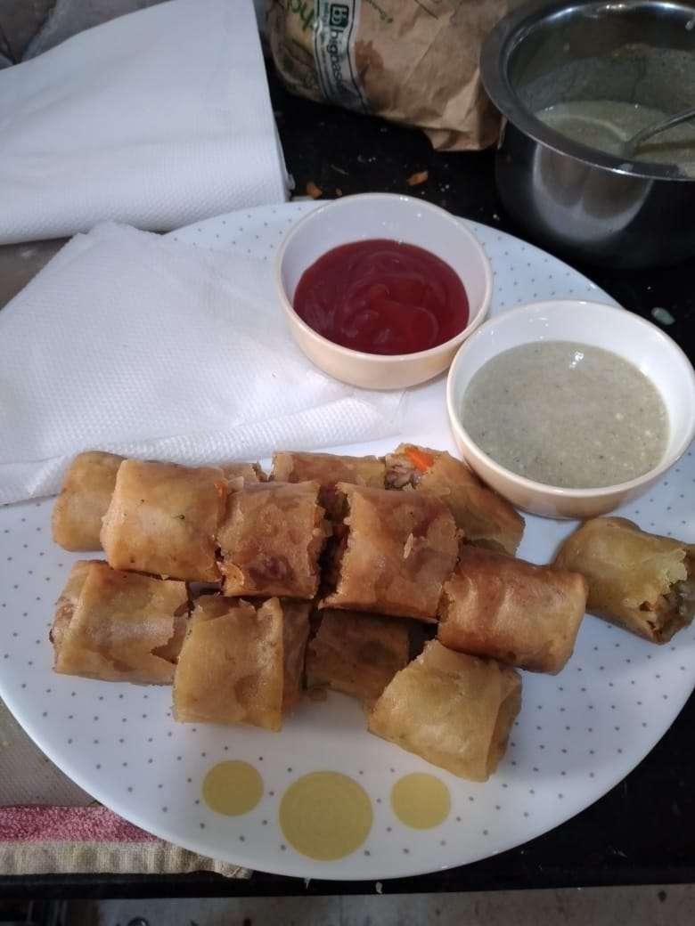 Tasty Veg Spring Rolls cooked by COOX chefs cooks during occasions parties events at home