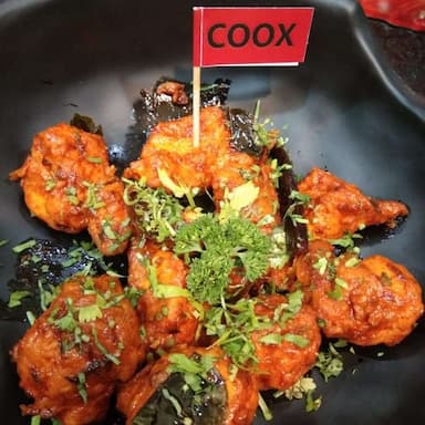 Tasty Chicken 65 cooked by COOX chefs cooks during occasions parties events at home