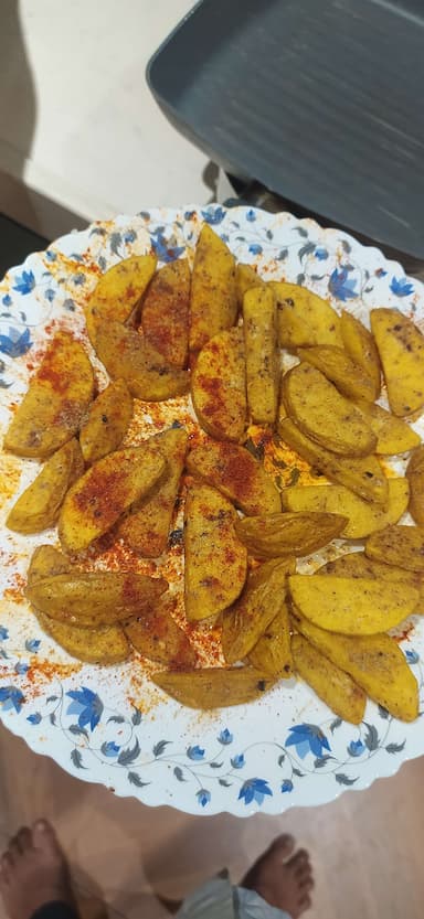 Tasty Potato Wedges cooked by COOX chefs cooks during occasions parties events at home