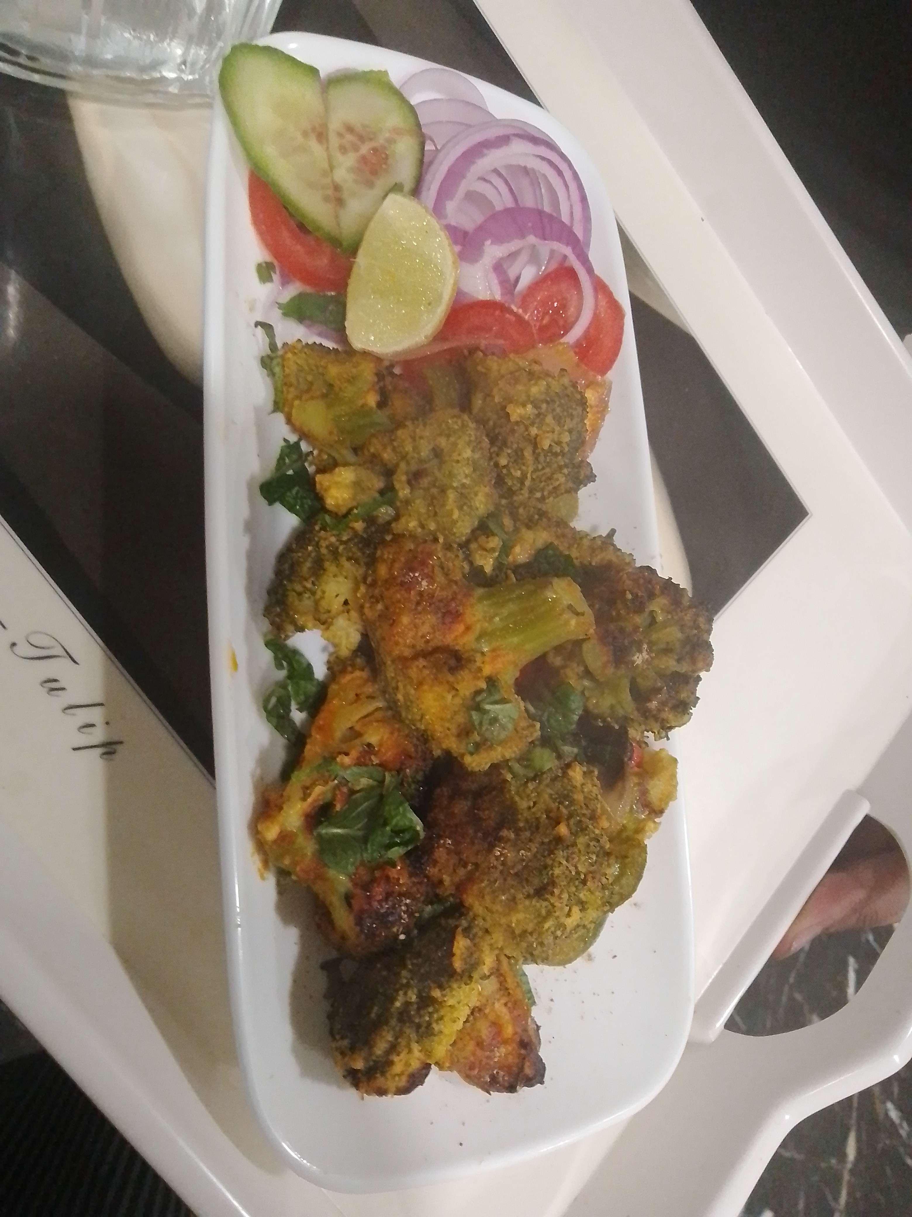 Tasty Tandoori Broccoli cooked by COOX chefs cooks during occasions parties events at home