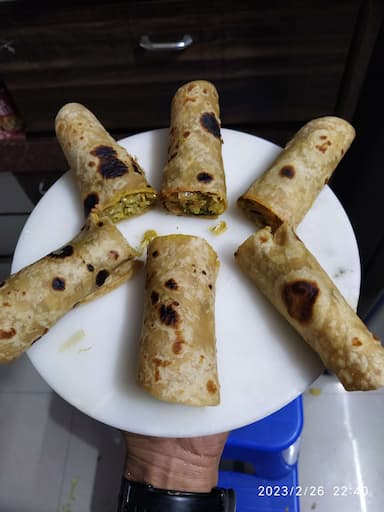Tasty Chicken Kathi Rolls cooked by COOX chefs cooks during occasions parties events at home