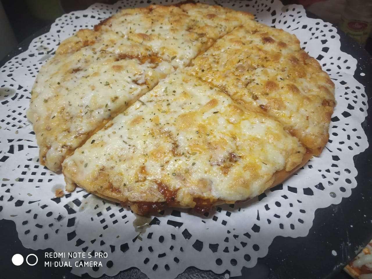 Delicious Margherita Pizza prepared by COOX