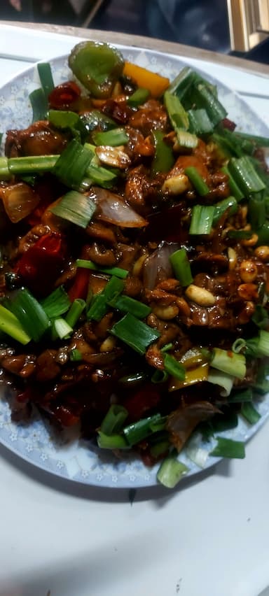 Tasty Kung Pao Chicken cooked by COOX chefs cooks during occasions parties events at home