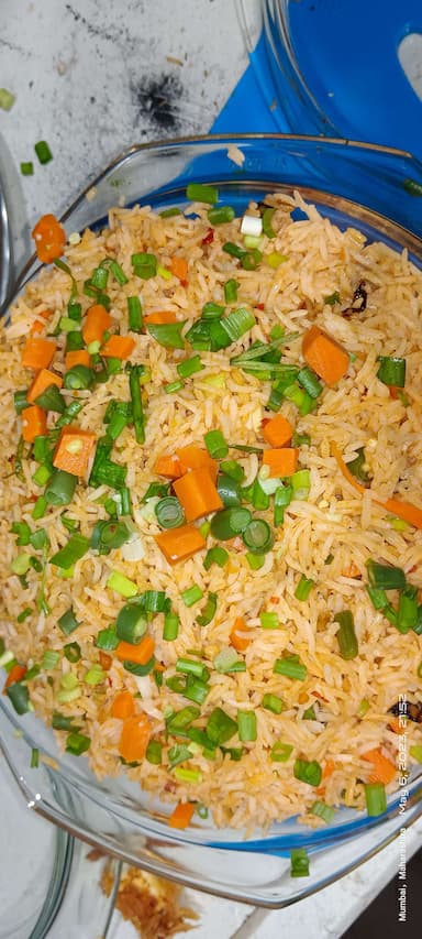 Tasty Schezwan Fried Rice cooked by COOX chefs cooks during occasions parties events at home