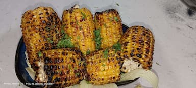 Tasty Grilled Corn cooked by COOX chefs cooks during occasions parties events at home