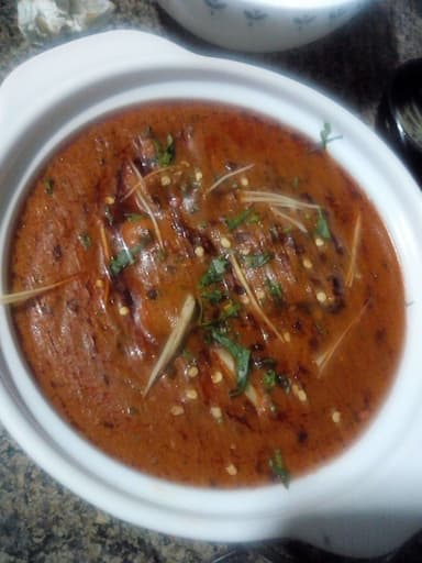Tasty Chicken Tikka Masala cooked by COOX chefs cooks during occasions parties events at home