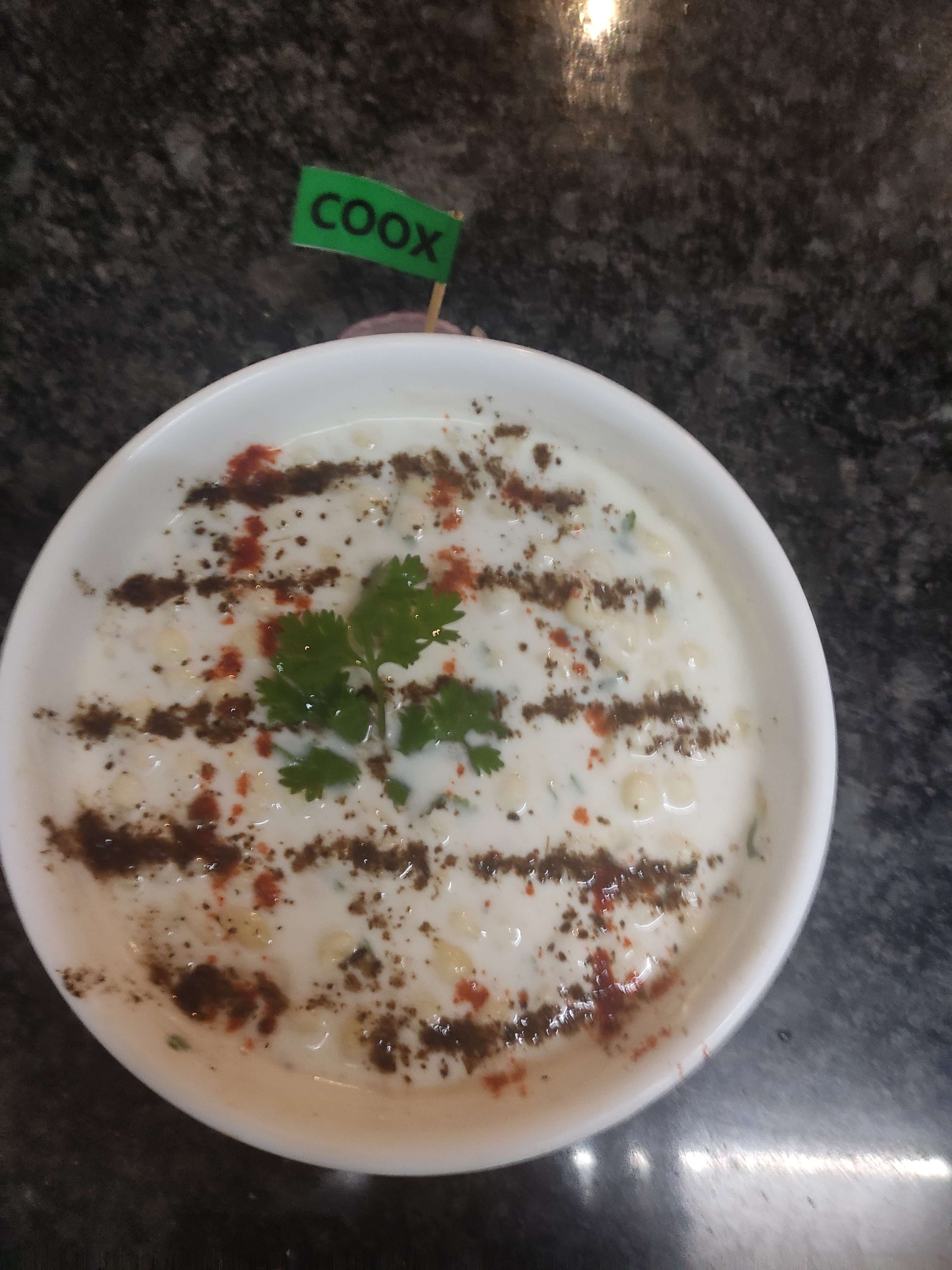 Tasty Boondi Raita cooked by COOX chefs cooks during occasions parties events at home