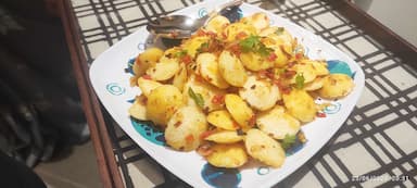 Tasty Fried Idli cooked by COOX chefs cooks during occasions parties events at home