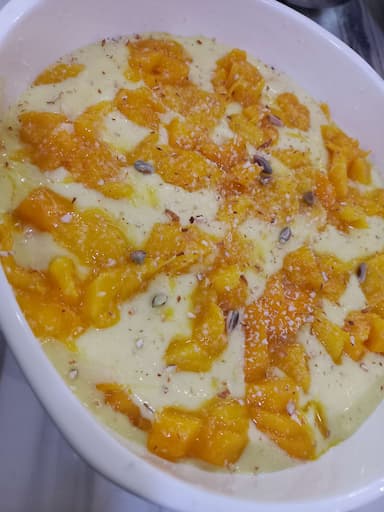 Tasty Mango Phirni cooked by COOX chefs cooks during occasions parties events at home