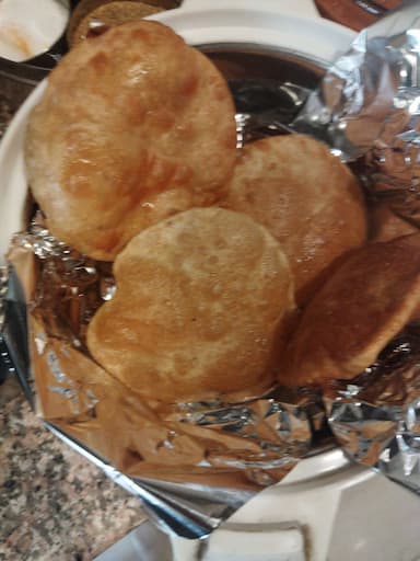 Tasty Poori Bhaji cooked by COOX chefs cooks during occasions parties events at home