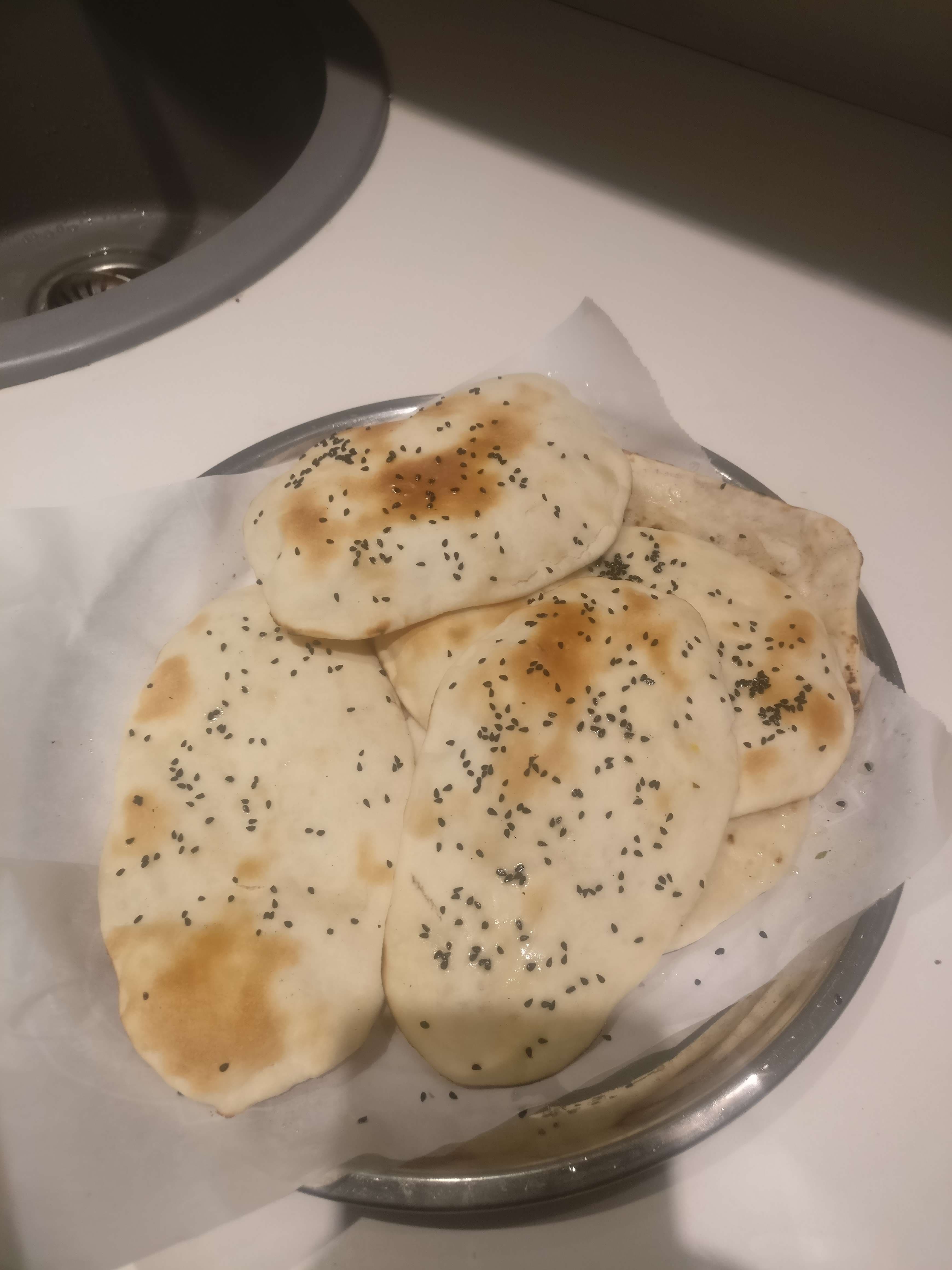 Tasty Naan (Butter / Garlic) cooked by COOX chefs cooks during occasions parties events at home