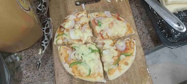 Tasty Margherita Pizza cooked by COOX chefs cooks during occasions parties events at home