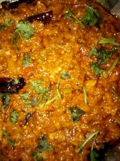 Tasty Baingan ki Sabzi cooked by COOX chefs cooks during occasions parties events at home