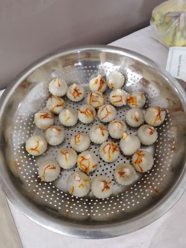 Tasty Modak cooked by COOX chefs cooks during occasions parties events at home