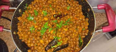 Tasty Kala Chana(Dry) cooked by COOX chefs cooks during occasions parties events at home