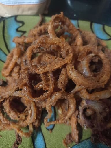 Tasty Onion Rings cooked by COOX chefs cooks during occasions parties events at home