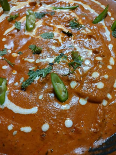 Tasty Chicken Tikka Masala cooked by COOX chefs cooks during occasions parties events at home