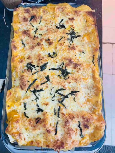 Tasty Chicken Lasagna cooked by COOX chefs cooks during occasions parties events at home