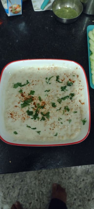 Tasty Mix Fruit Raita cooked by COOX chefs cooks during occasions parties events at home