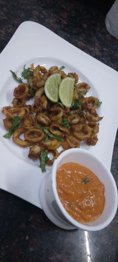 Tasty Calamari Rings cooked by COOX chefs cooks during occasions parties events at home