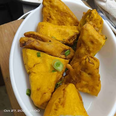 Tasty Bread Pakode cooked by COOX chefs cooks during occasions parties events at home