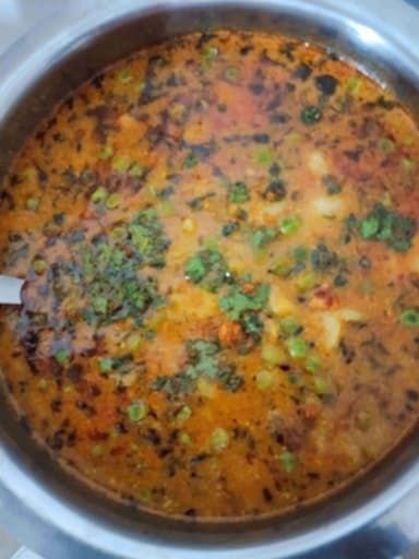 Tasty Aloo Matar cooked by COOX chefs cooks during occasions parties events at home