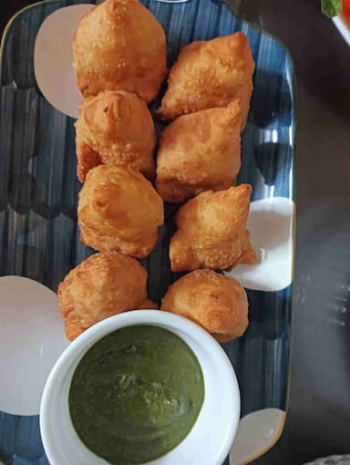 Tasty Mini Samosas cooked by COOX chefs cooks during occasions parties events at home