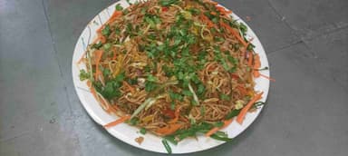 Tasty Chilli Garlic Noodles cooked by COOX chefs cooks during occasions parties events at home