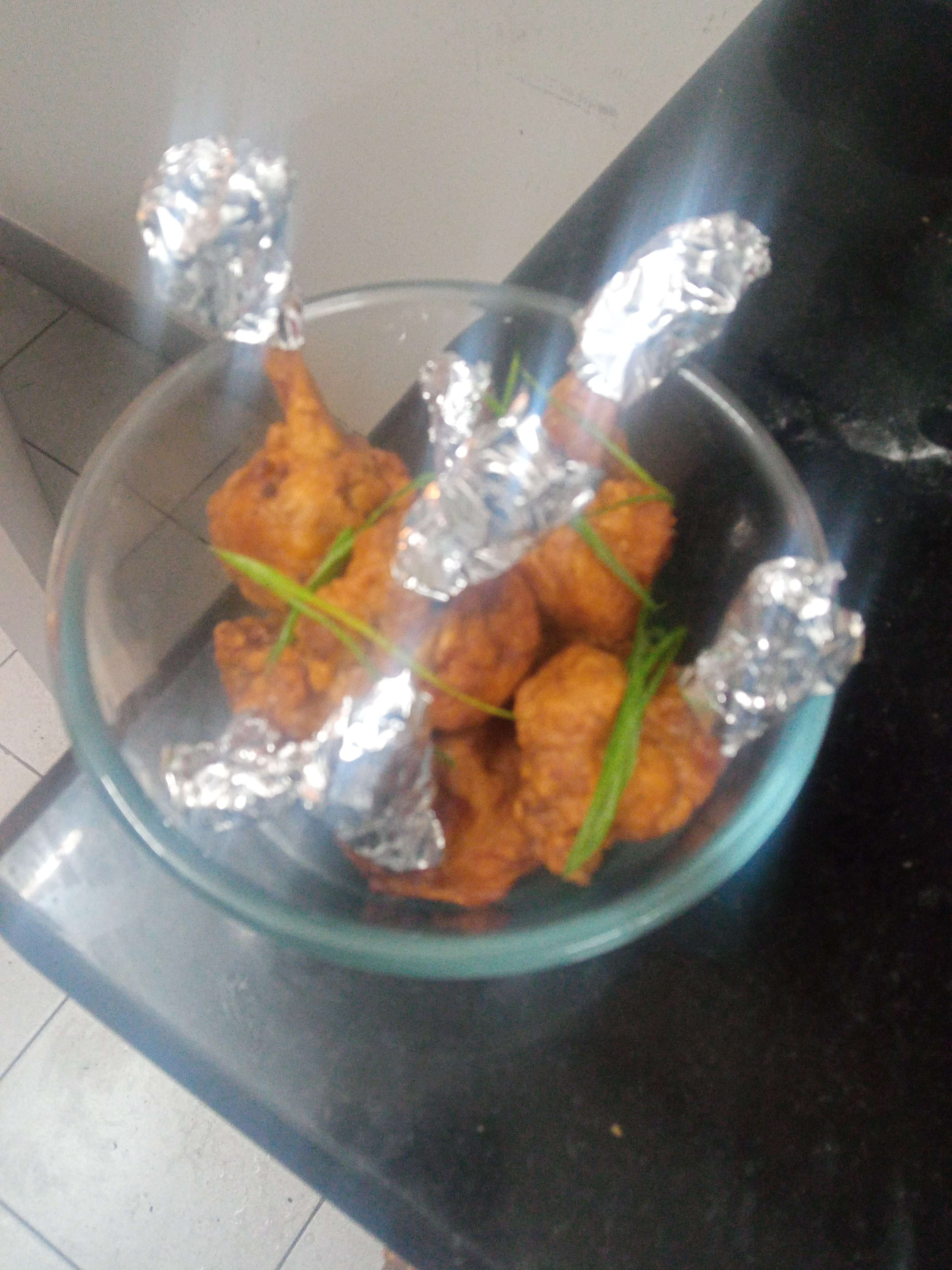 Tasty Chicken Lollipop cooked by COOX chefs cooks during occasions parties events at home