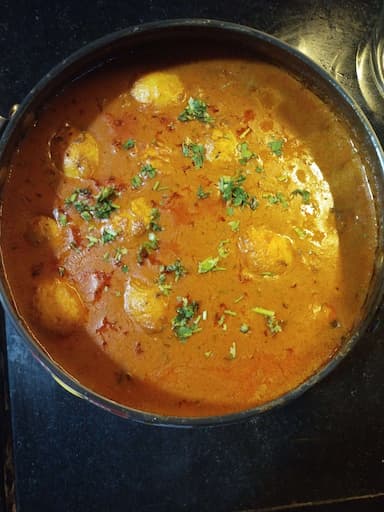 Delicious Egg Curry prepared by COOX