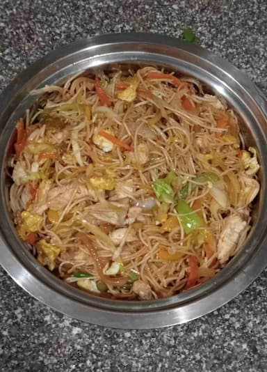 Tasty Chicken Hakka Noodles cooked by COOX chefs cooks during occasions parties events at home