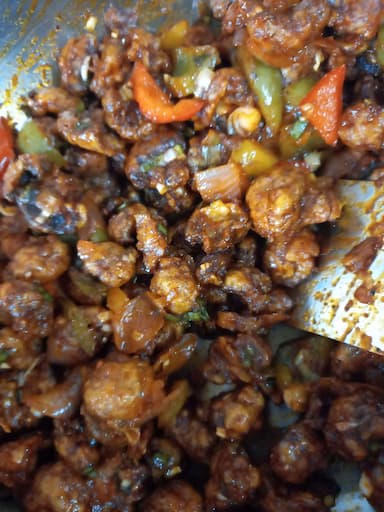 Tasty Chilli Mushroom cooked by COOX chefs cooks during occasions parties events at home
