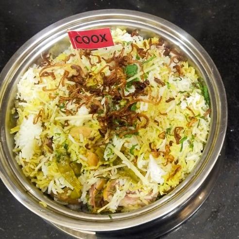 Tasty Chicken Biryani cooked by COOX chefs cooks during occasions parties events at home