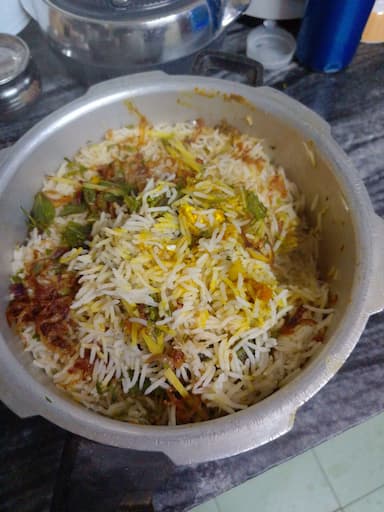 Tasty Mutton Biryani cooked by COOX chefs cooks during occasions parties events at home