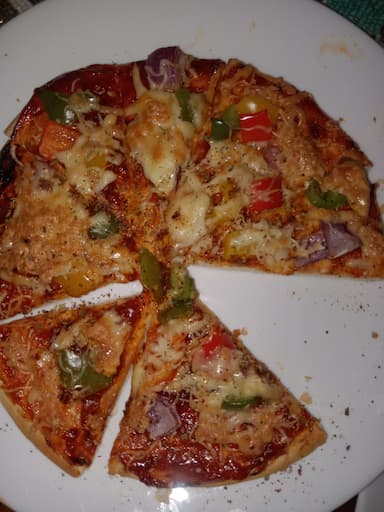 Tasty Chicken Pizza cooked by COOX chefs cooks during occasions parties events at home
