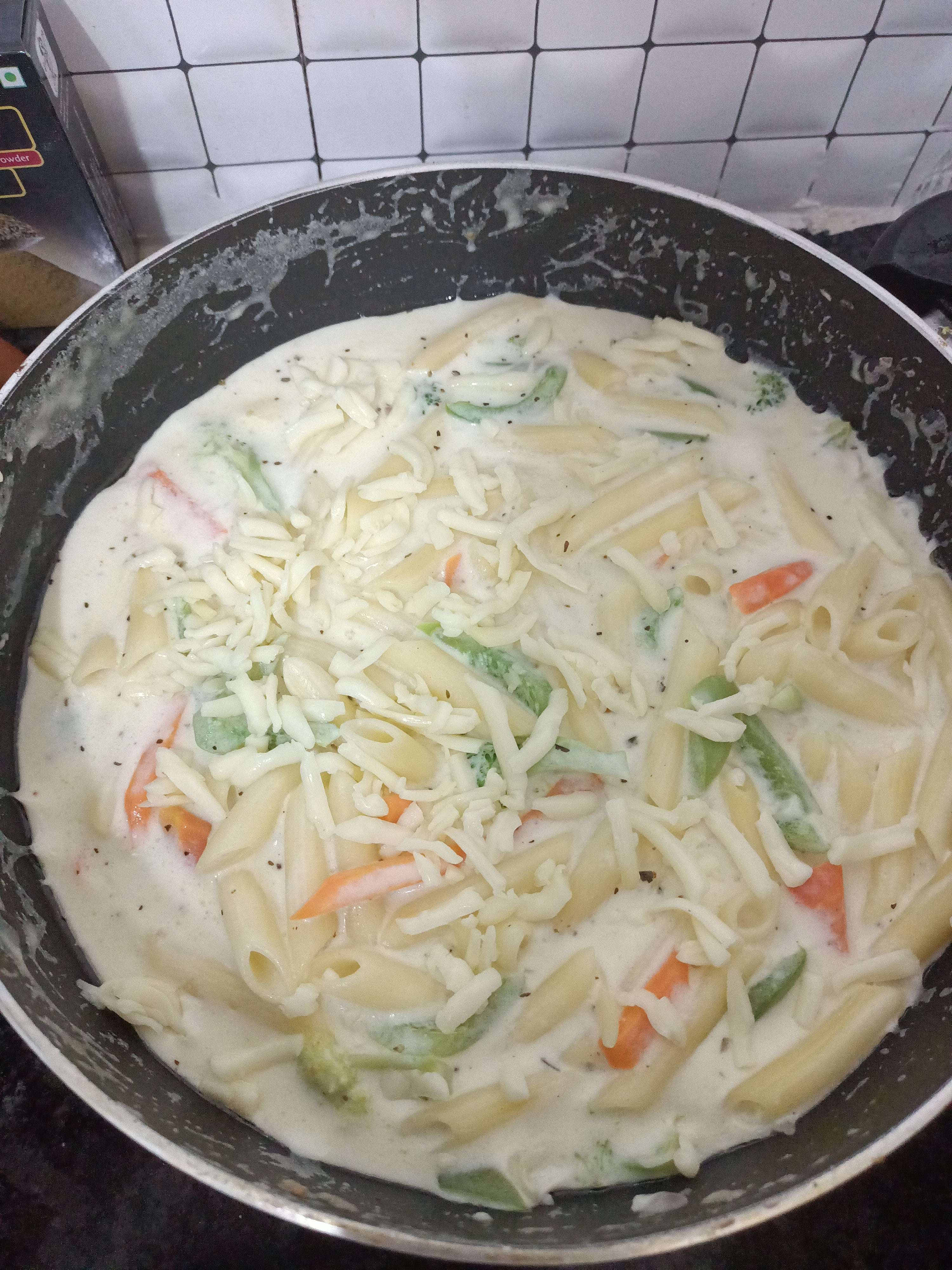 Tasty Pasta in White Sauce cooked by COOX chefs cooks during occasions parties events at home