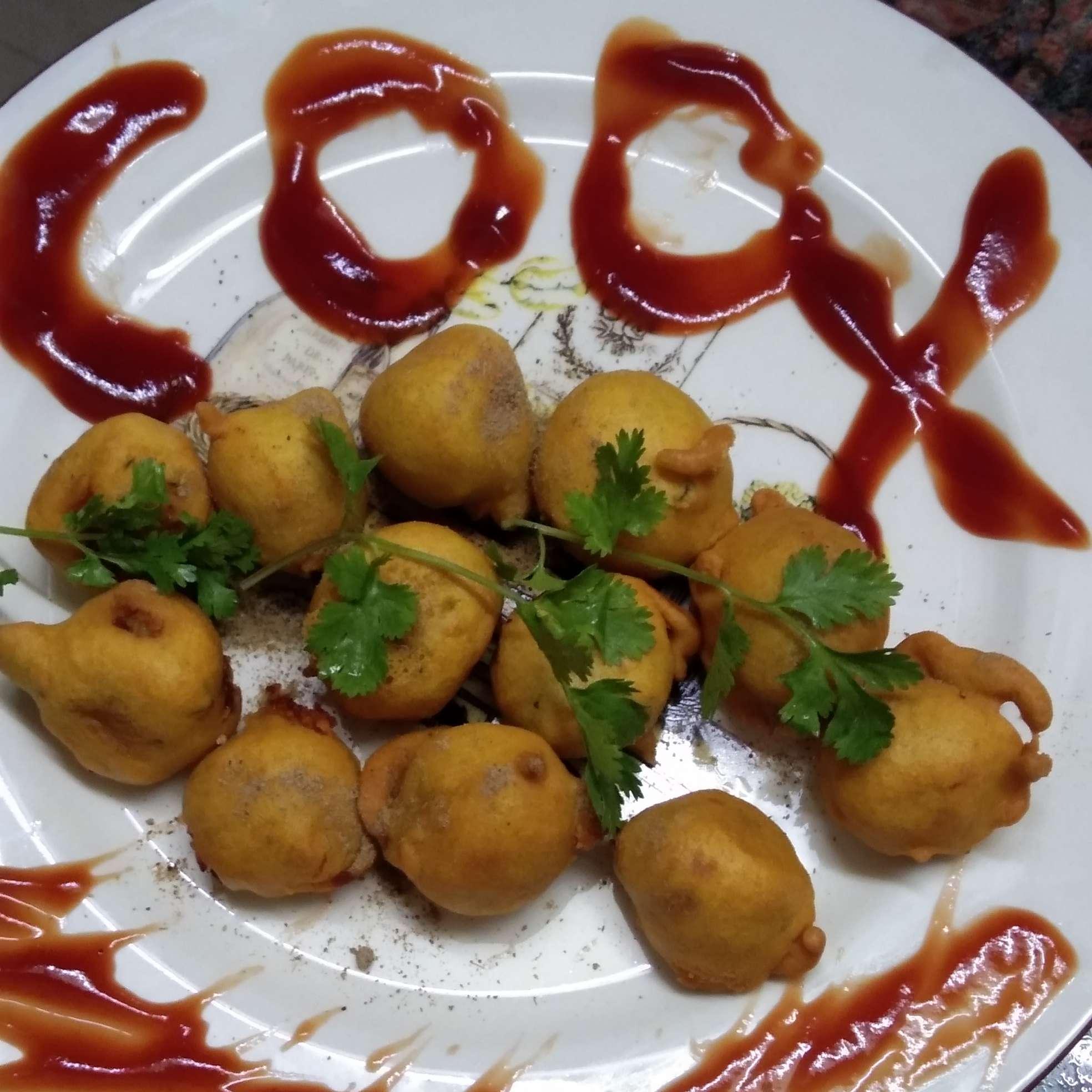 Delicious Aloo Bonda prepared by COOX