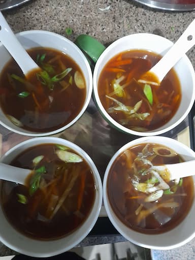 Tasty Hot & Sour Soup cooked by COOX chefs cooks during occasions parties events at home