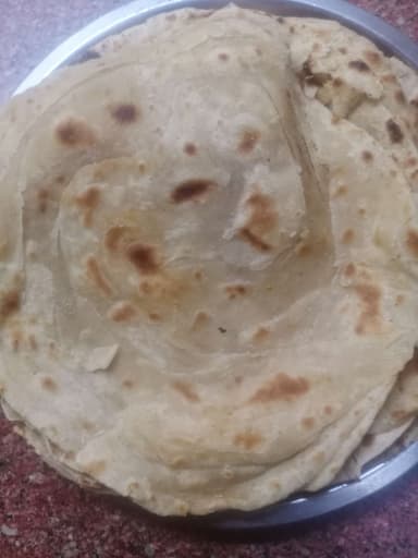 Tasty Lachha Parathas cooked by COOX chefs cooks during occasions parties events at home