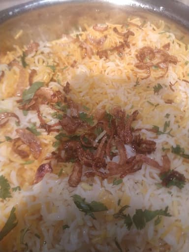 Tasty Egg Biryani cooked by COOX chefs cooks during occasions parties events at home
